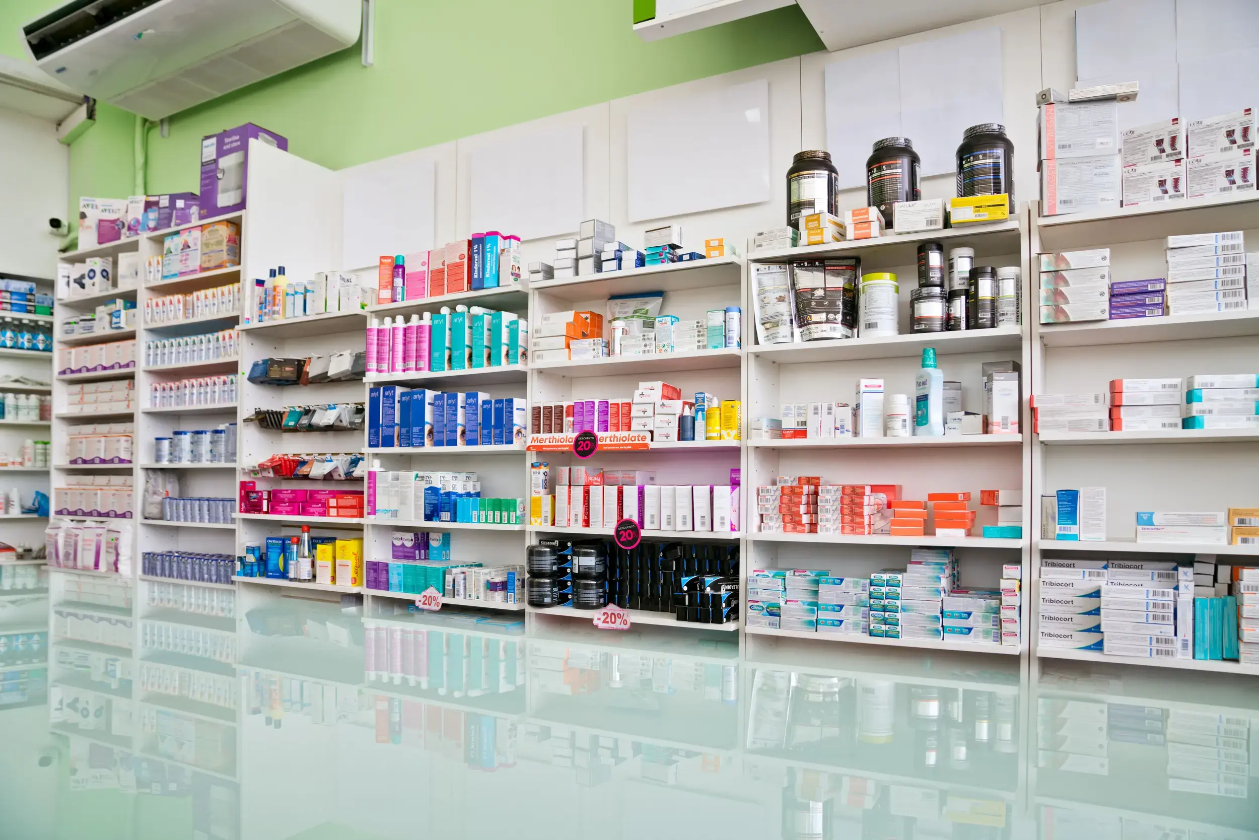 Pharmacy shelves with an assortment of different behind the counter items