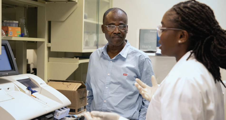 Dr. Safo and lab professional