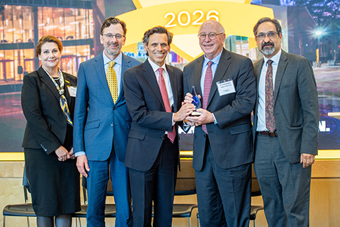 B. Frank Gupton receiving an award, standing with the vice president for research development, president of VCU, and vice president for research at the 2026 ARIA event.