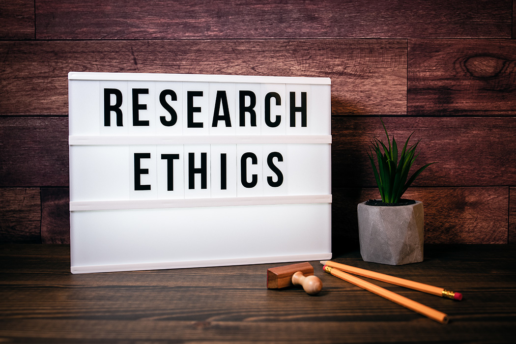 Research ethics on a board
